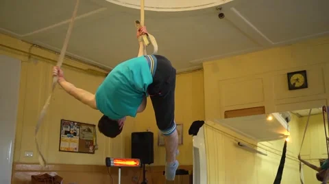 The guy trains circus show acrobatics Stock Footage 47159731