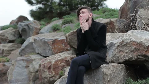 The guy is trying to concentrate or remember something Stock Footage 88886885