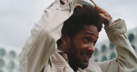 A guy trying on his virtual reality glasses Stock Footage 201114446