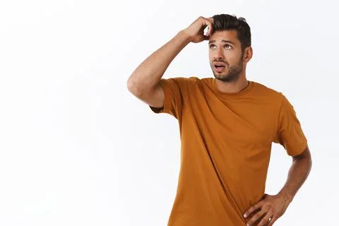Guy trying solve situation, thinking way out of problem. Attractive hipster man Stockfoto's