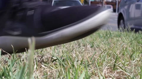 Guy Tying Shoe, Step Into Frame Stock Footage 134738600