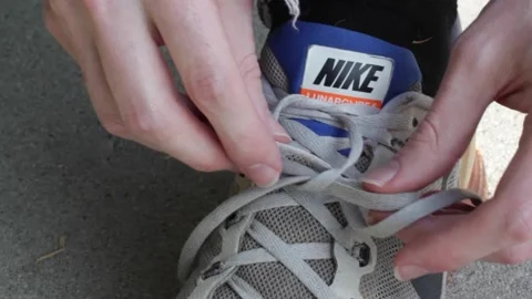 Guy Tying Show, Step Out Stock Footage 134738420