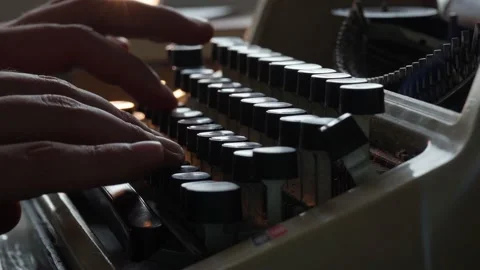 Guy types on an old typewriter and smokes cigarettes, writer, journalist Stock Footage 138812837