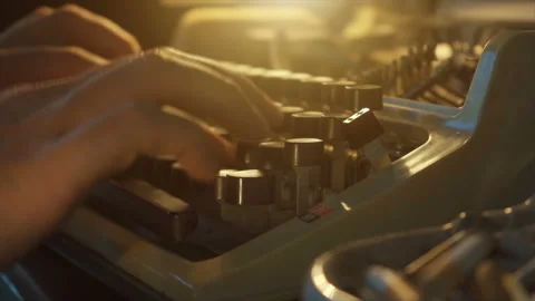 Guy types on an old typewriter and smokes cigarettes, writer, journalist Stock Footage 143318031