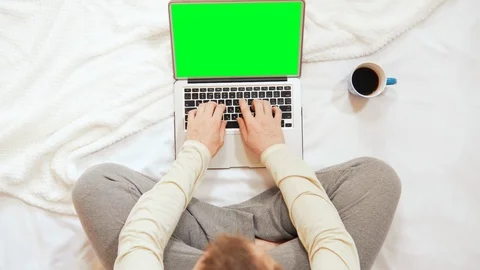 Guy typing on computer at home Stock Footage 116490844
