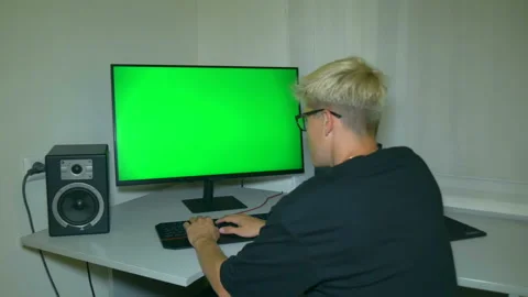 Guy is typing text on the keyboard then turns around. Stock Footage 204947192