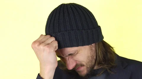 Guy upset. he's holding his head. Stock Footage 101318627