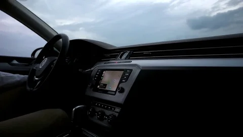 The guy uses the navigation in the car Stock Footage 80431420