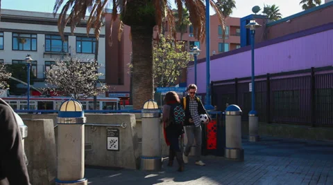 Guy uses phone getting off subway Stock Footage 37065764