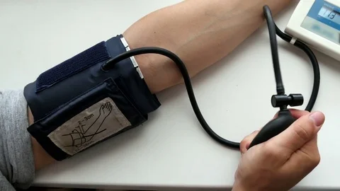 Guy uses a pressure gauge Stock Footage 80358372