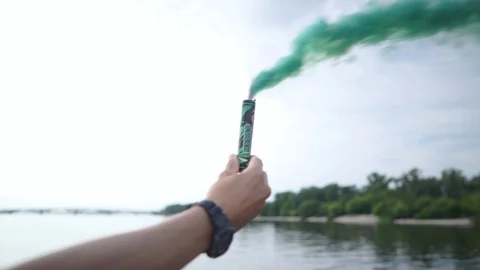The guy uses a smoke bomb 스톡 동영상 91394828