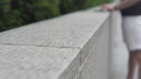 The guy uses the tablet on the street, only hands are visible Stock-Footage 113405565