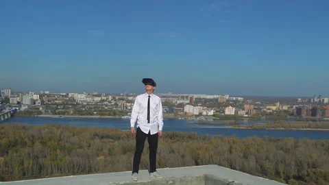 Guy uses a virtual reality glasses on the backfound of sky Stock Footage 96513874