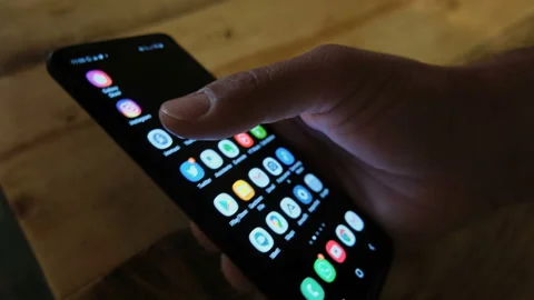 Guy using italian covid19 contact tracing app Immuni on smarphone,coronavirus Stock Footage 131652091