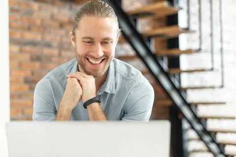 A guy is using laptop for video call Stock Photos