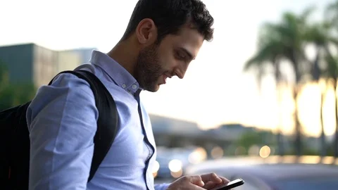 Guy Using Mobile Stock Footage 89242802