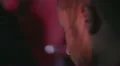 Guy using phone in night club HD Footage