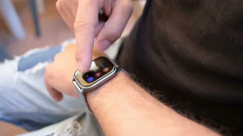 Guy using smart watch to check notification,new hi tech connectivity device Video stock 136964914