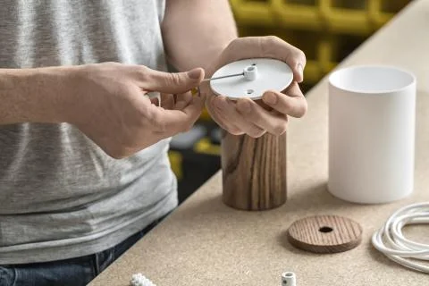 Guy using wrench in workshop Stock Photos