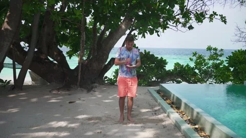 The guy on vacation recovered a lot Stock Footage 148082332