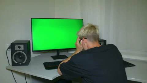 Guy is very disappointed with what is shown on the computer screen. Stock Footage 204946989