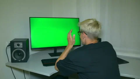 Guy is very disappointed with what is shown on the computer screen. Stock Footage 204947037