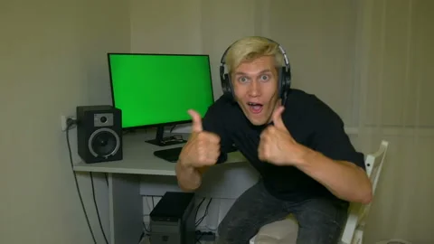 Guy is very happy with what is shown on the computer screen. Stock Footage 204946818