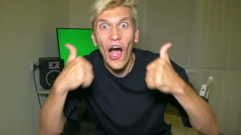 Guy is very happy with what is shown on the computer screen. Stock Footage 204946897