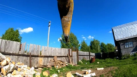 The guy vigorously chopping birch logs with a log splitter.Woodman. Stock Footage 110667721