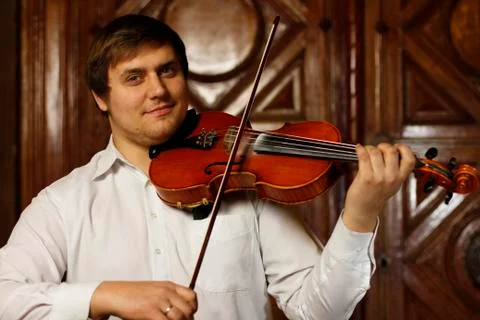 Guy with a violin Stock Photos