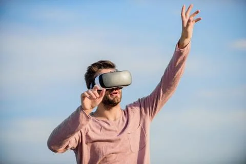 Guy virtual reality goggles. Using VR technologies. Digital future and Stock Photos