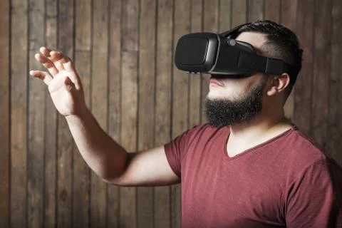 Guy with vr glasses showing gesture. Virtual reality glasses Stock Photos