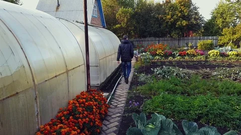 Guy is walking along the path Video stock 80373596
