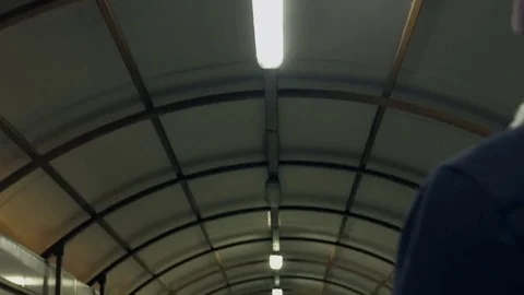 Guy is walking along the pedestrian crossing Stock Footage 80481187