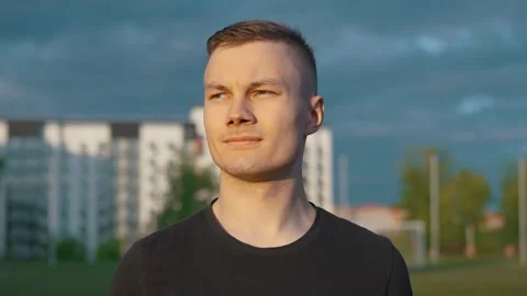 Guy walking around the stadium with abdominal rollerr in his hands abdominal 動画素材 260829569