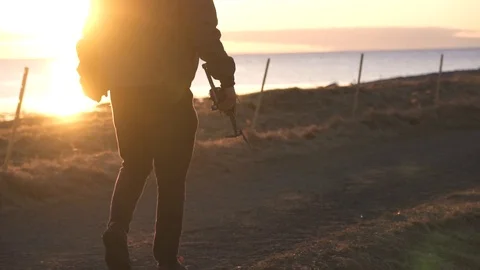 Guy walking with drone Stockbeeldmateriaal 87831408