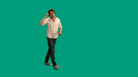 Guy walking with headphones - green screen - pre keyed - MINT.GS Video stock 11357375