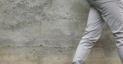 Guy walking in an hostile city with a face mask Stock Footage 129481133