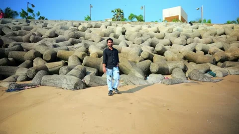 Guy Walking on Seascape Alone Stock Footage 281323609