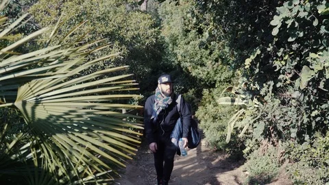 The guy walks along the forest path up Stock Footage 101270141