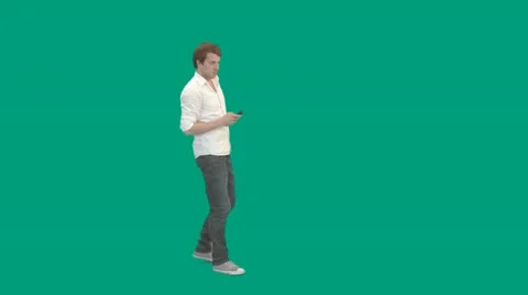 Guy walks in and uses remote control - green screen - pre keyed - MINT.GS Video stock 11344225