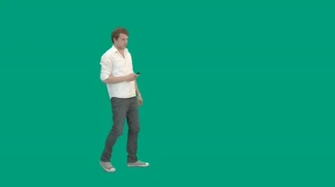 Guy walks in and uses remote control - green screen - pre keyed - MINT.GS Stock Footage 11344226