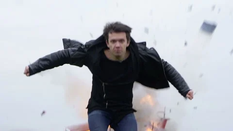 The guy walks away from the burning red car, car crash survivor. Car Explosion. Stock Footage 95198497