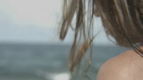 Guy walks at the beach Stock Footage 77629689