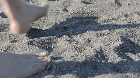 Guy walks on sand Stock Footage 115937349