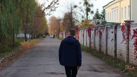 Guy walks through an abandoned building Stock Footage 130739356