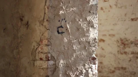 Guy walks through an abandoned building Stock Footage 130739734