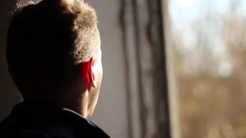 Guy walks through an abandoned building Stock Footage 130740039