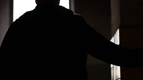 Guy walks through an abandoned building Stock Footage 130740062