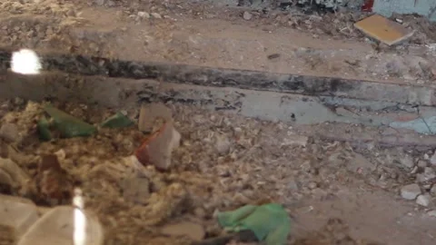 Guy walks through an abandoned building Stock Footage 130740127